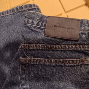 Vintage Calvin Klein dark blue mens jeans size 32 waist by 29 length